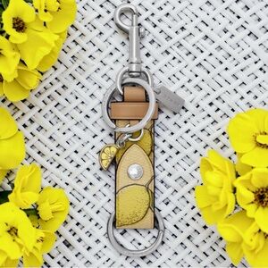New! COACH Lemon Print Trigger Snap Bag Charm (NWT)